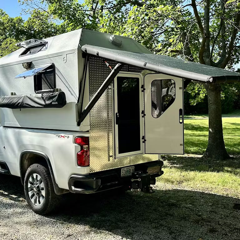 Off the back, over the tailgate
