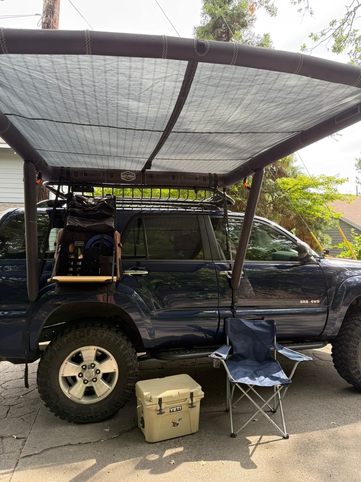 Toyota 4Runner with outside gear setup with inflatable awning 