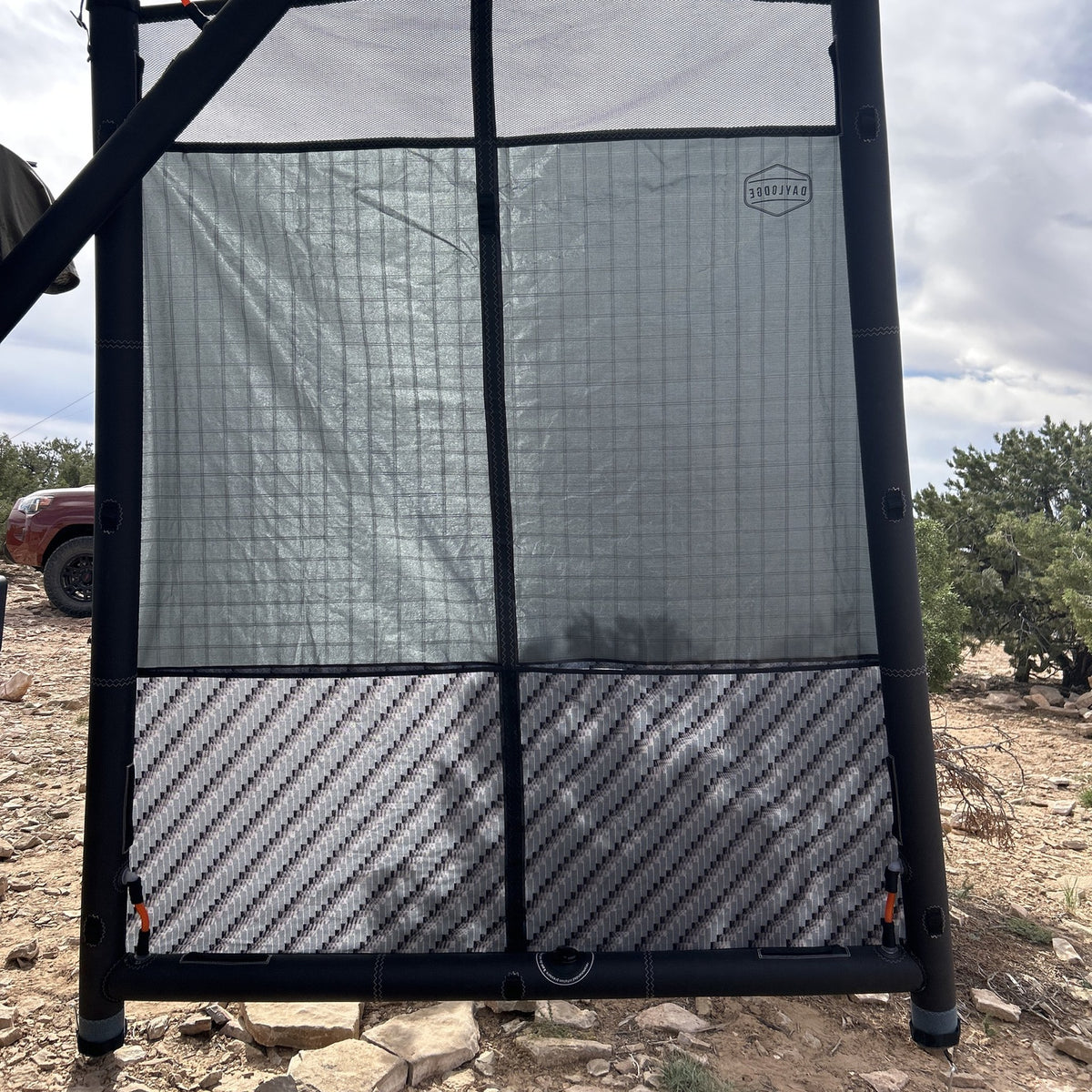 AirHaven 30 Annex Wall with mesh window panel, set up under a Carbon Camo AirHaven 30