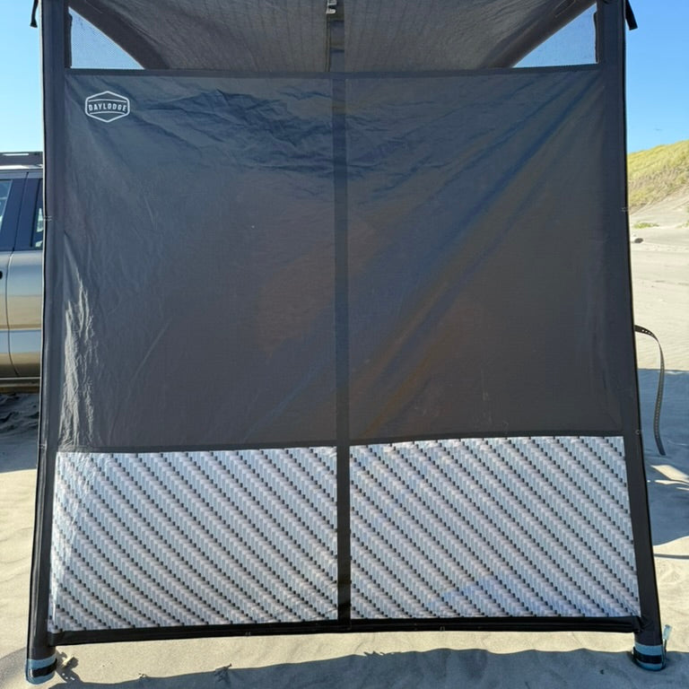 AirHaven 40 Annex Wall set up on the beach, mesh top vents and reflective lower panels