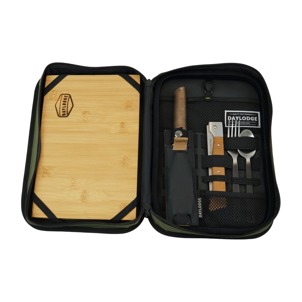 Gaucho open and packed: bamboo cutting board on one side, knives, utensils and tools in the utility panel