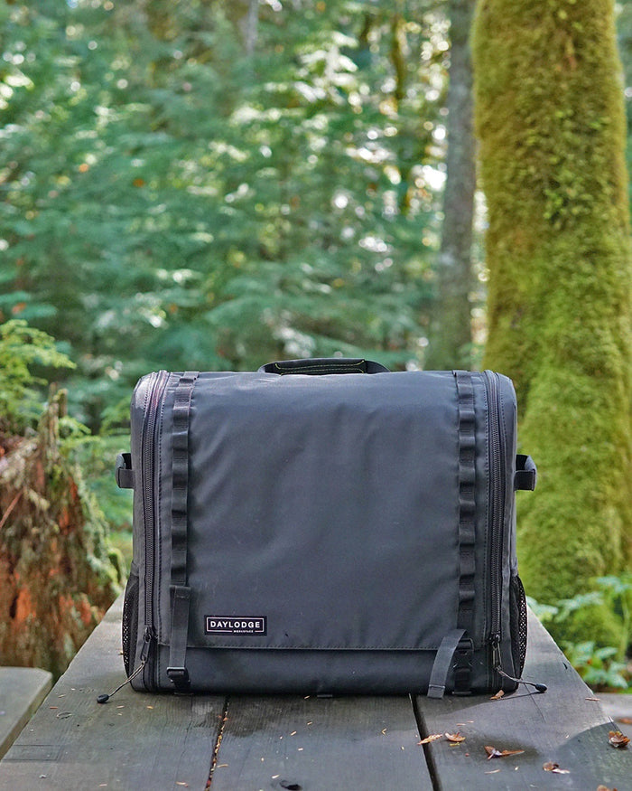 Workspace packed and closed on a picnic table in the forest