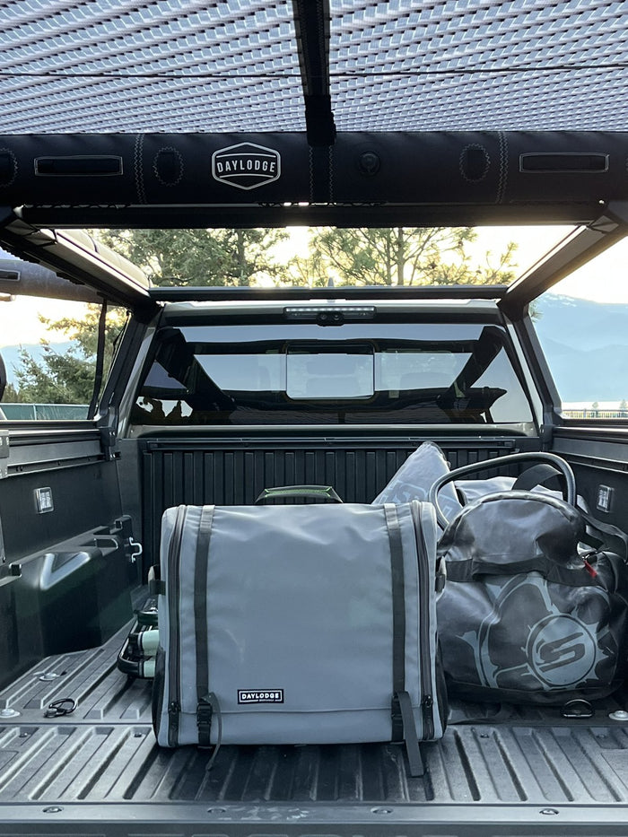 Closed Workspace riding in a truck bed under an AirHaven awning